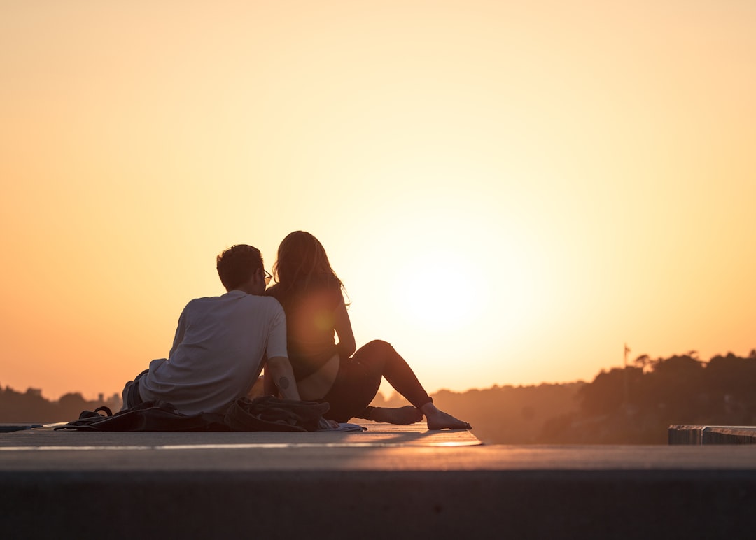 silhouette of hugging couple